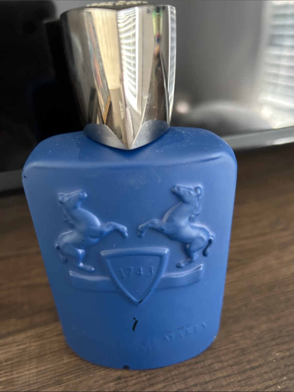 Armani Exchange Blue Fragrance Bottle with Silver Cap